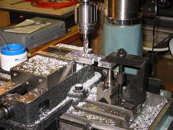  Machining the Yokes out of aluminum. Aluminum is fun to cut compared to steel! It is easy to machine and more forgiving if you are using a not quite sharp cutter. I'm actually making two parts out of one piece of aluminum and in the final step of cutting them apart.