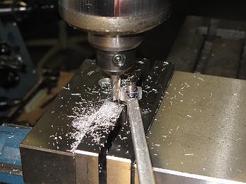 Rods14Jan09 006 Taking a light cut and CONVENTIONAL milling the end of the eccentric rod.