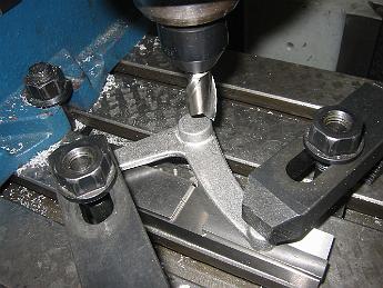 TumblingShaftLever12Nov08 004 With the machined ends down and under the clamps, we take light cuts on the unsupported end.