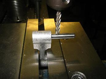 ValveGear10Dec08 001 10-Dec-08 time to cut some slots.  The lifting link is short enough to hold in the vise jaws.  A quick bump of the cutter a close fitting pin allows us to get a reference dimension to set the slot cut depth.