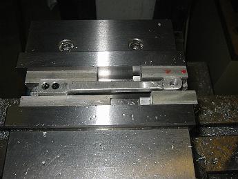 ValveMotion26Nov08 001 How do you hold these castings?  With the draft (taper) in them from the moulding process, there isn't a straight spot to start from.