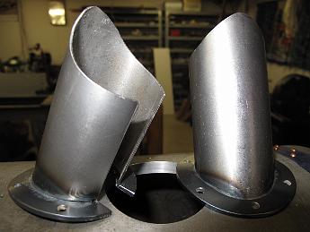 FinishingSteamPipeShroud27-May09 007 27-May-09 The welded steam shrouds ready for fitting to the smokebox shell.