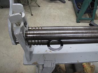 RollingSteamPipeCasing13-May09 007 We used my antique roller to roll the casing and casing flanges.  These are 2
