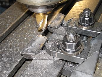 SmokeboxShellHinges1Apr08 009 Using a resharpened carbide bit (the only way I can afford carbide cutters are by getting used ones) we oh so gently cut the back of the hinges. After a single pass we could see the hardened parts of the hinge which tore up the drill bits earlier.