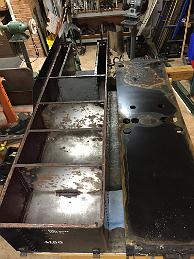 Tender Tank Leak Overhaul 2019-10-28 Tender Tank Overhaul -- The tender has been leaking water. Opening it up revealed a failure of the coating, due to poor application. I begin stripping the old Redkote coating off revealing some prime bare metal and some rusty metal.
