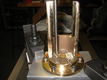 MikadoCoversCompletion15Nov06 001 15-Nov-06 One of the last steps is to drill and tap the packing gland holes.  It's a close one for the spotting drill and tap -- check out the clearance between the side of the crosshead jaws.