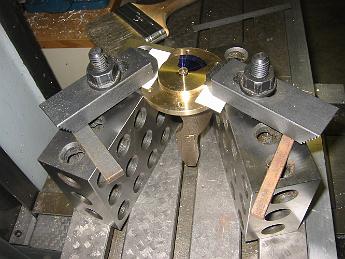 MikadoCoversCompletion15Nov06 002 15-Nov-06 We decided to 'open up' the valve ports a little bit and mill some exhaust steam passages.  This was not call for in the prints, but similar to the piston covers.