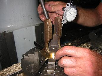 MikadoPistonCovers04Oct06 003 4-Oct-06  Bill taps around on the Rear Valve cover to align the casting in our 'chuck on a table' holder.