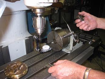 MikadoRearValveCovers11Oct06 001 11-Oct-06 Checking the trueness of the horizontal rotary table.  Even though it is a used veteran, it runs with 0.0005