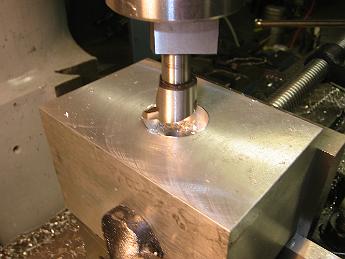 MikadoRearValveCovers14Oct06 002 14-Oct-06 Having reached the limit of the boring head, we put a fly cutter in to complete the hole.