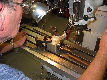 MikadoRearValveCovers26Oct06 001 26-Oct-06 Dialing in the Valve Crosshead Jaws mounting fixture to be parallel to the table travel.