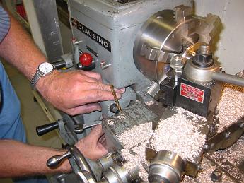 MikadoSteamChestCovers26July06 005 26-July-06 How to set a carriage stop when you do not have a micrometer stop.  Use something, in case a drill bit, which is the same size of the offset you are trying to set.  Shim stock and dowel pins also work.