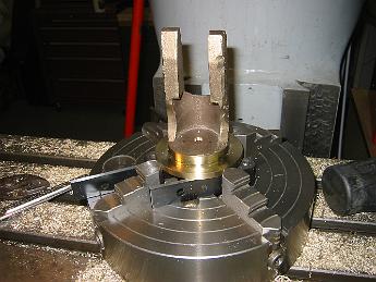 MikadoValveCovers18Sept6 002 18-Sept-06 The most challenging part to chuck so far - the rear valve/crosshead casting.  We will need extra long drills and taps to complete this job.